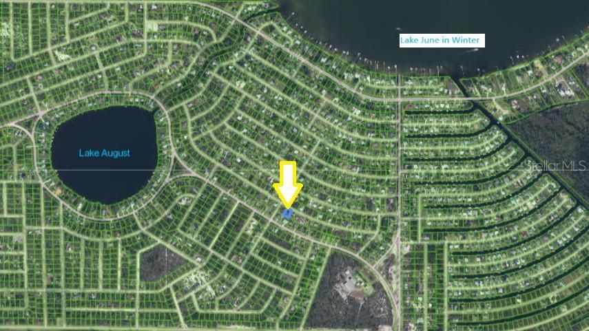 vacant lot for sale in Placid Lakes, central water and deeded lake access to Lake June.