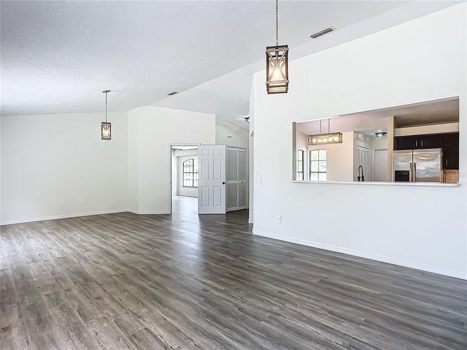 open concept living room, dining room