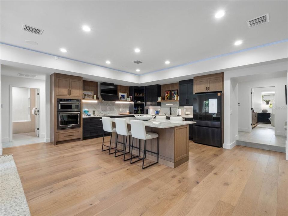 Quality upgrades galore in this kitchen featuring built-in oven and induction cooktop