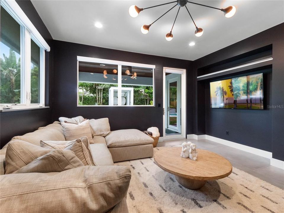 Family room with gorgeous views of the backyard oasis