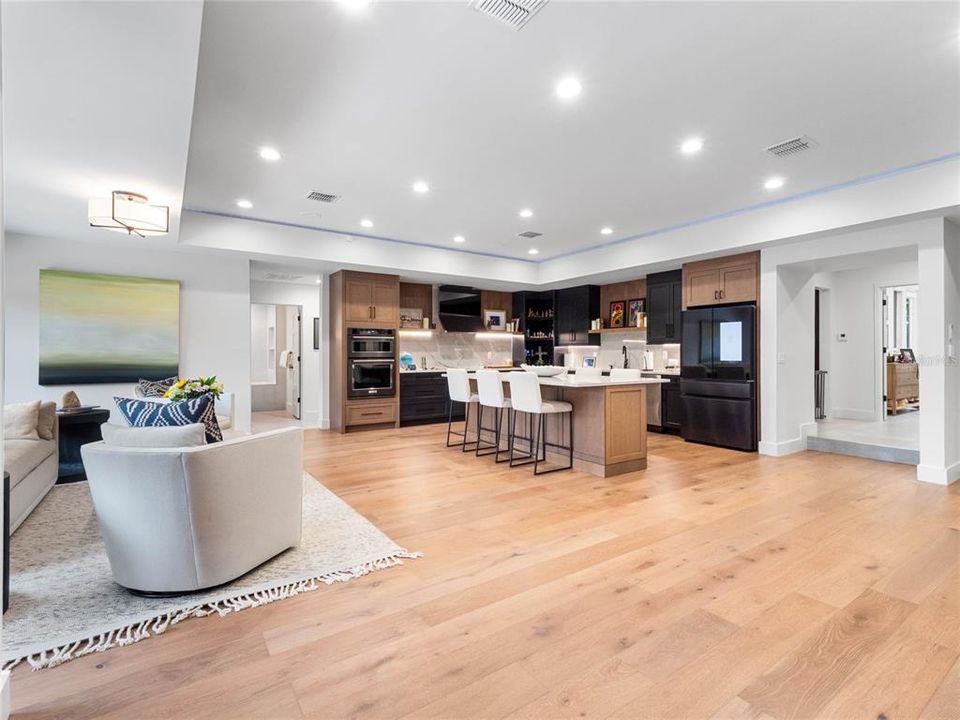 Hallway at the back of the kitchen leads to the family room