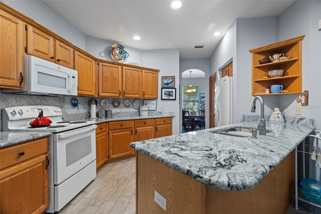 This granite, including the backsplash, is gorgeous!