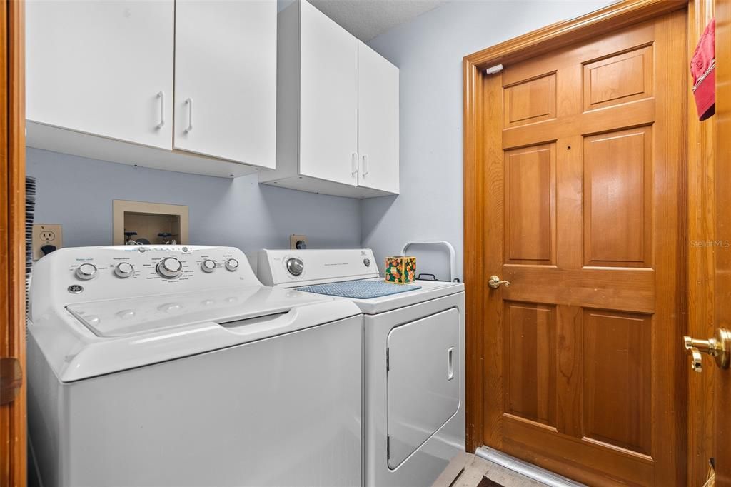 Washer and dryer in the indoor laundry room stay with your new home.