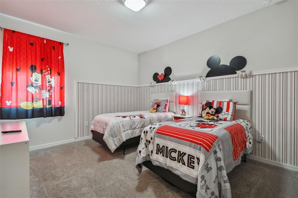 2nd floor Mickey Minnie bedroom with adjacent bathroom