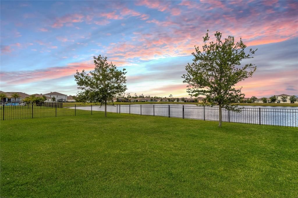 Fenced yard on lake