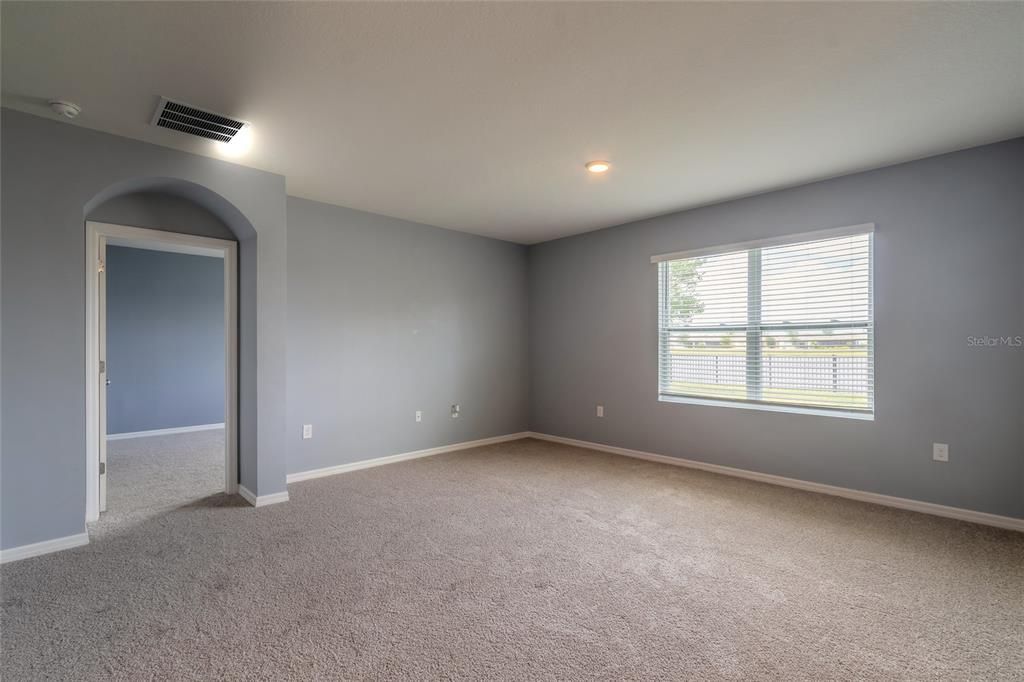 Primary bedroom w/ lakeviews