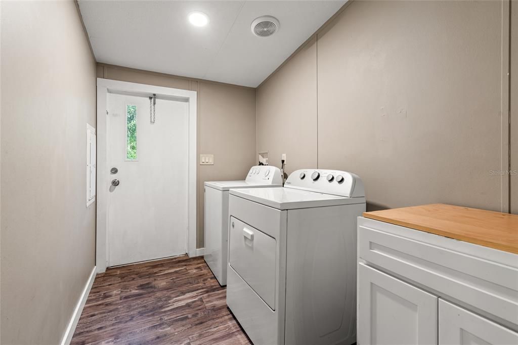 Laundry Room with Access to Back Yard