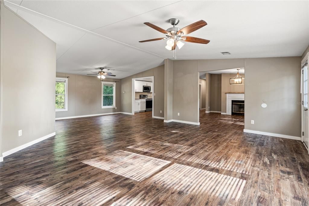 Great Room, Family Room, Dining Room and Kitchen all in the Center of the Home