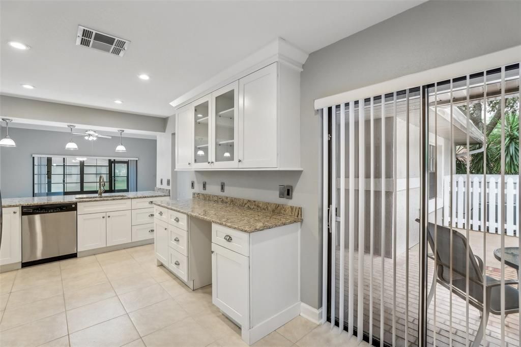 Your kitchen has direct access to the oversized fenced in courtyard for your entertaining!