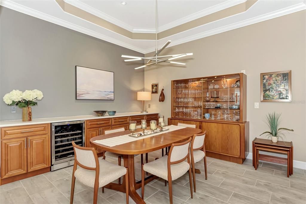 The dining room has built in serving/storage with a wine cooler to store your favorite VINO.