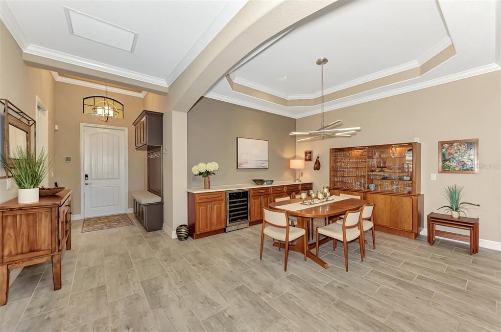 The dining room has built in serving/storage with a wine cooler to store your favorite VINO.