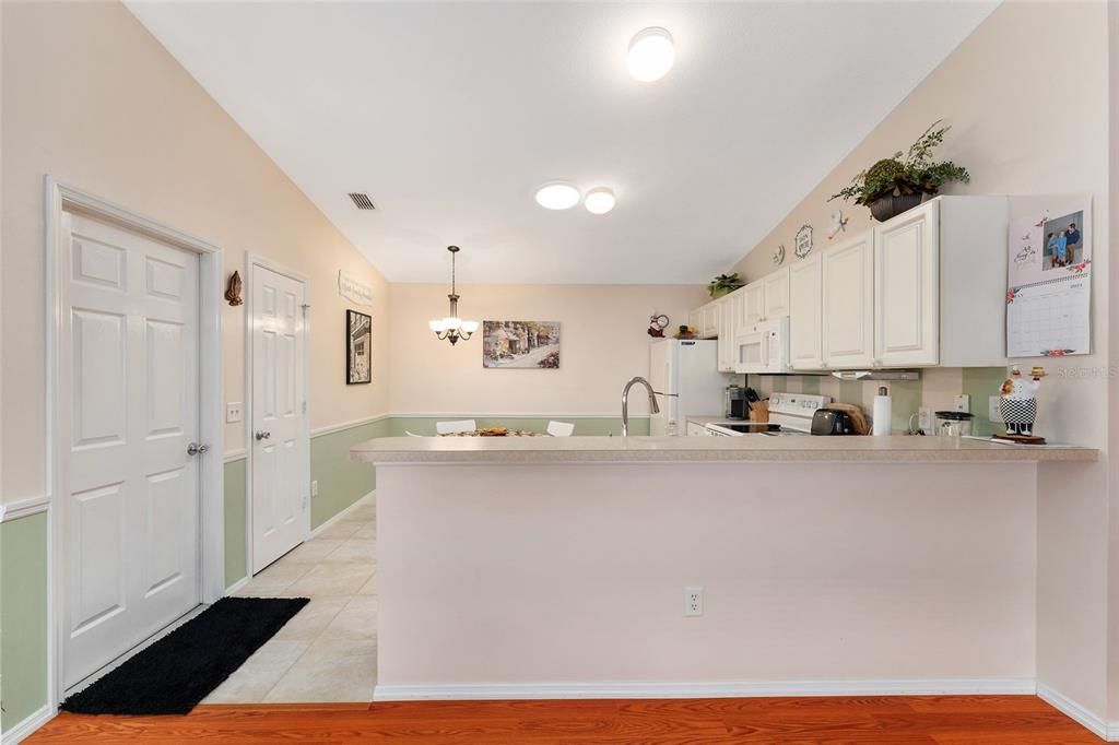 KITCHEN IS OPEN TO LIVING AND DINING AREAS