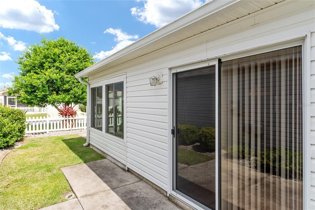 SIDE PATIO WITH SLIDER ACCESS TO HOME