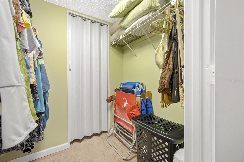 Primary Bedroom with Large Walk in Closet and Extra Storage Space.