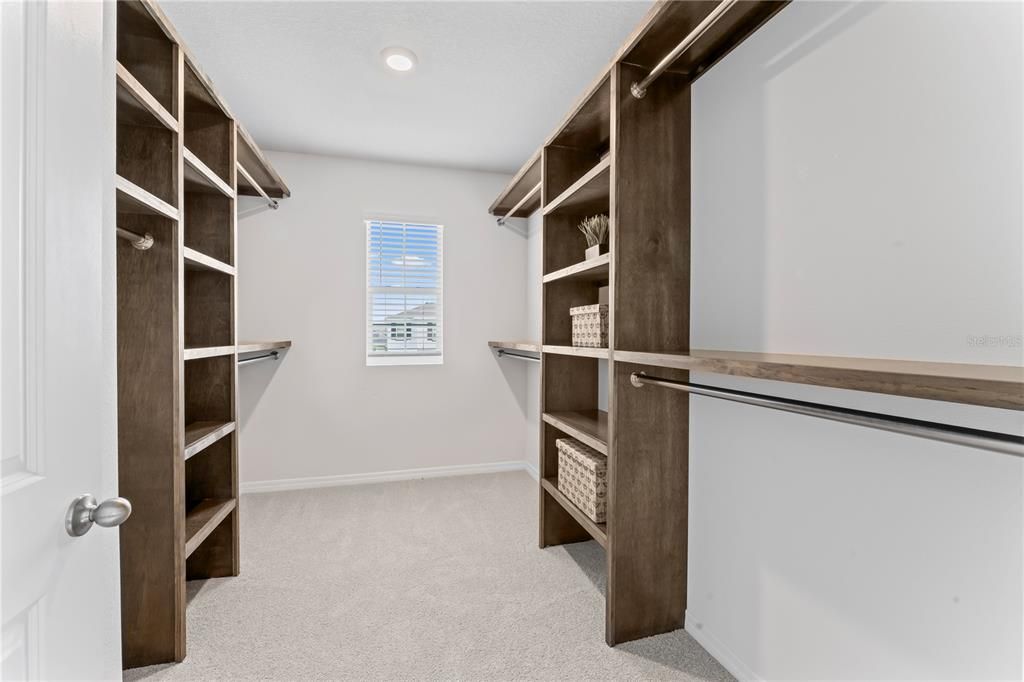 Huge Walk-In Closet with Built-Ins
