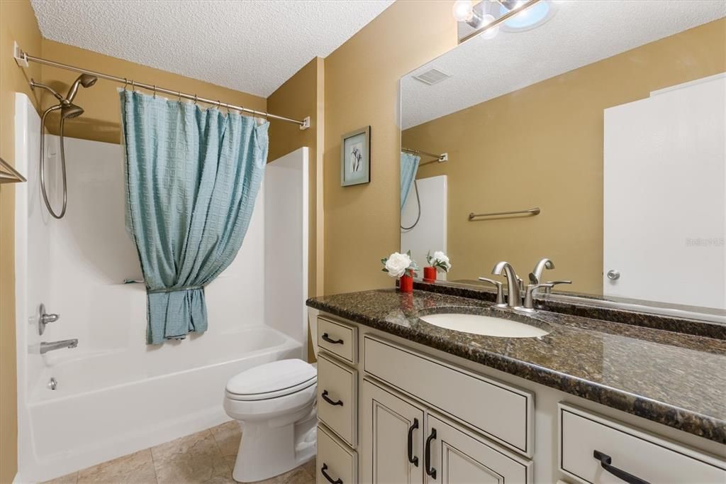 Bathroom 2 - Updated Cabinetry and Granite Countertop