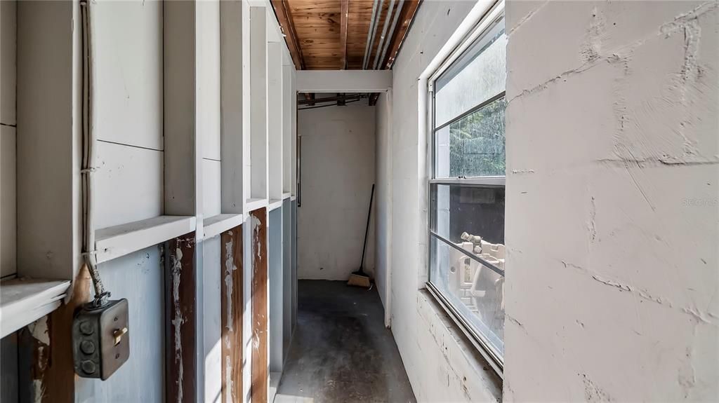 Downstairs walk through to huge storage room