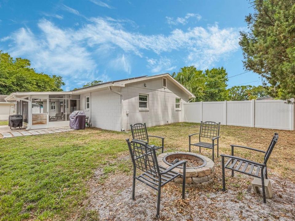 Back yard with seats and firepit