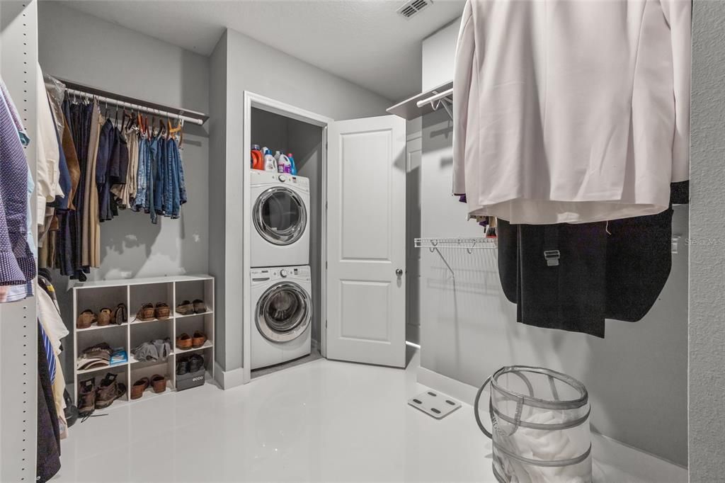 Laundry inside the primary walk-in closet downstairs