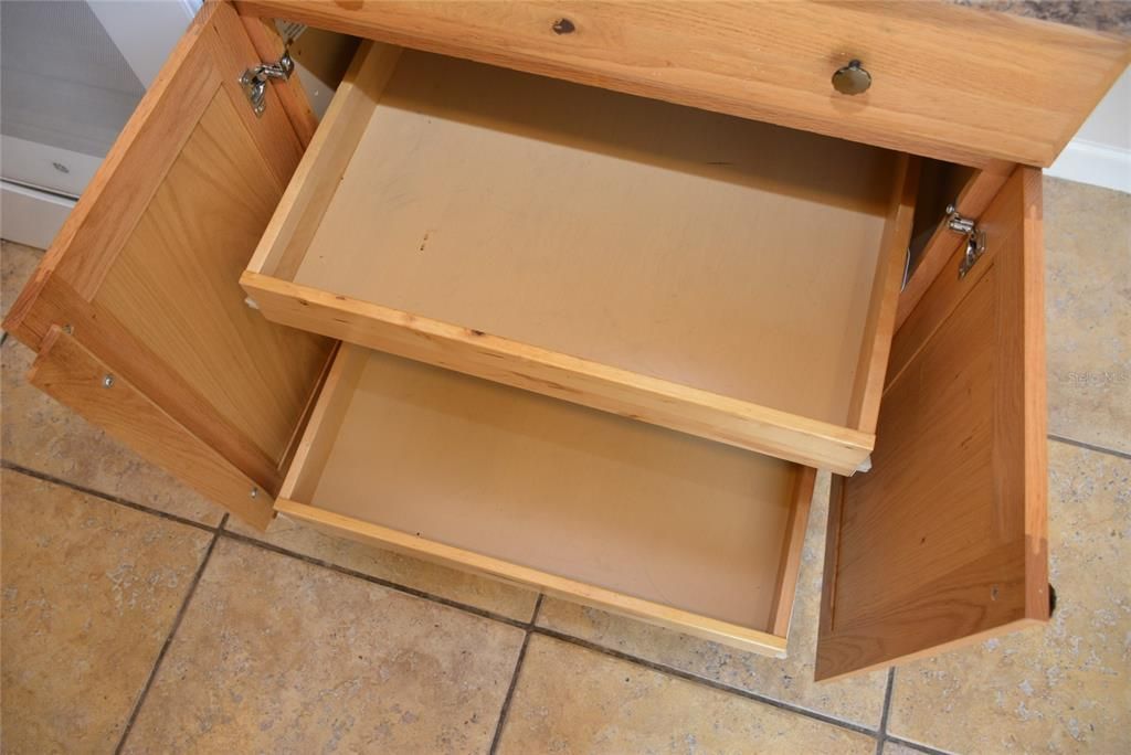 Pull out drawers make easy access to deep cabinets