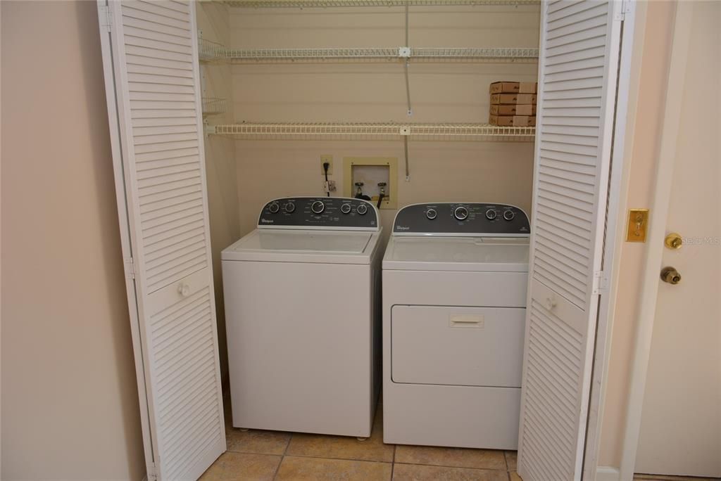 Kitchen also includes a laundry closet complete with Washer & Dryer and access to an oversize two car garage with automatic opener