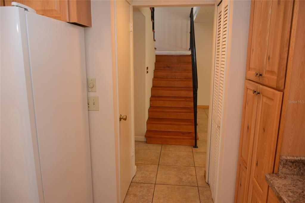 Looking from the kitchen to the Foyer and Stairway