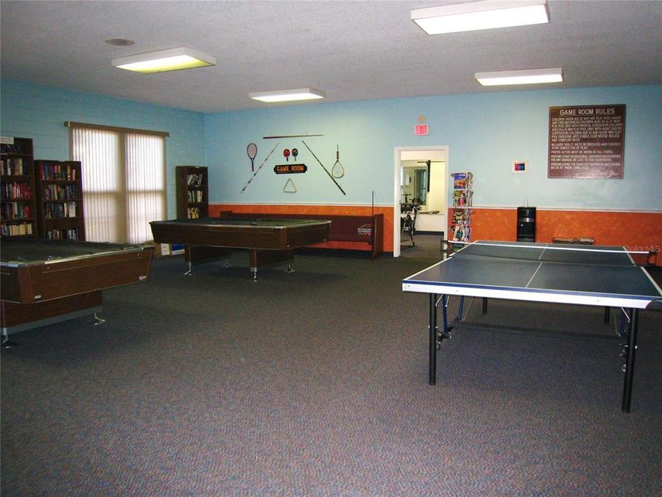 Amenities also include a Game room with ping-pong and pool tables, shuffleboard, a library with books, exercise room, sauna, auditorium for private events