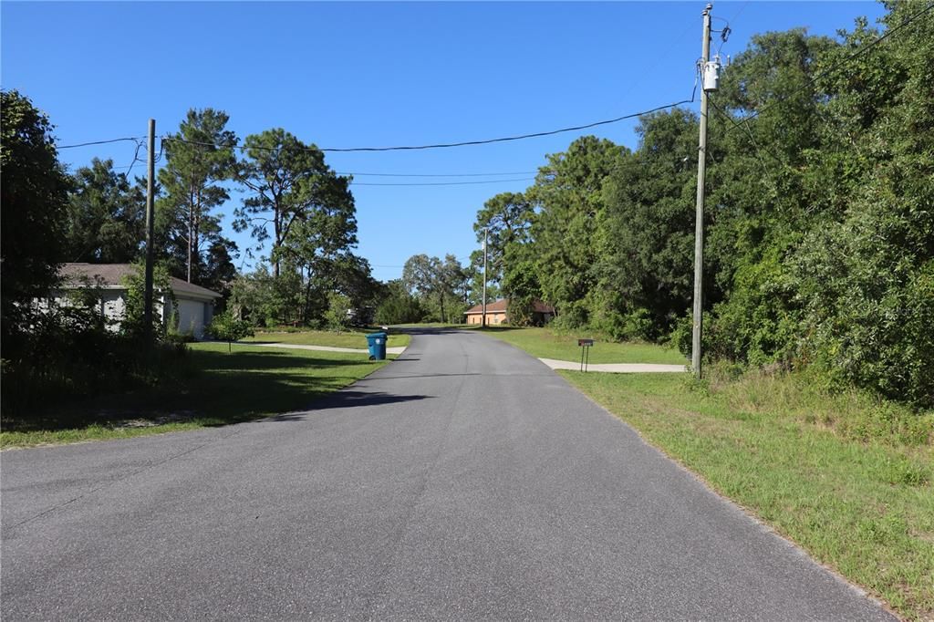 ROAD HEADING SOUTH IN FRONT OF PROPERTY