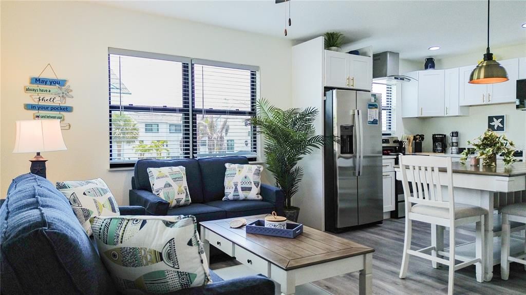 Unit D view of living room and kitchen