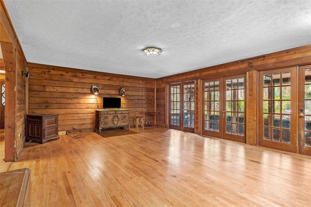 Great room with french doors to covered porch.