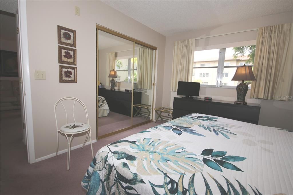 Main Bedroom showing Mirrored Closet Doors