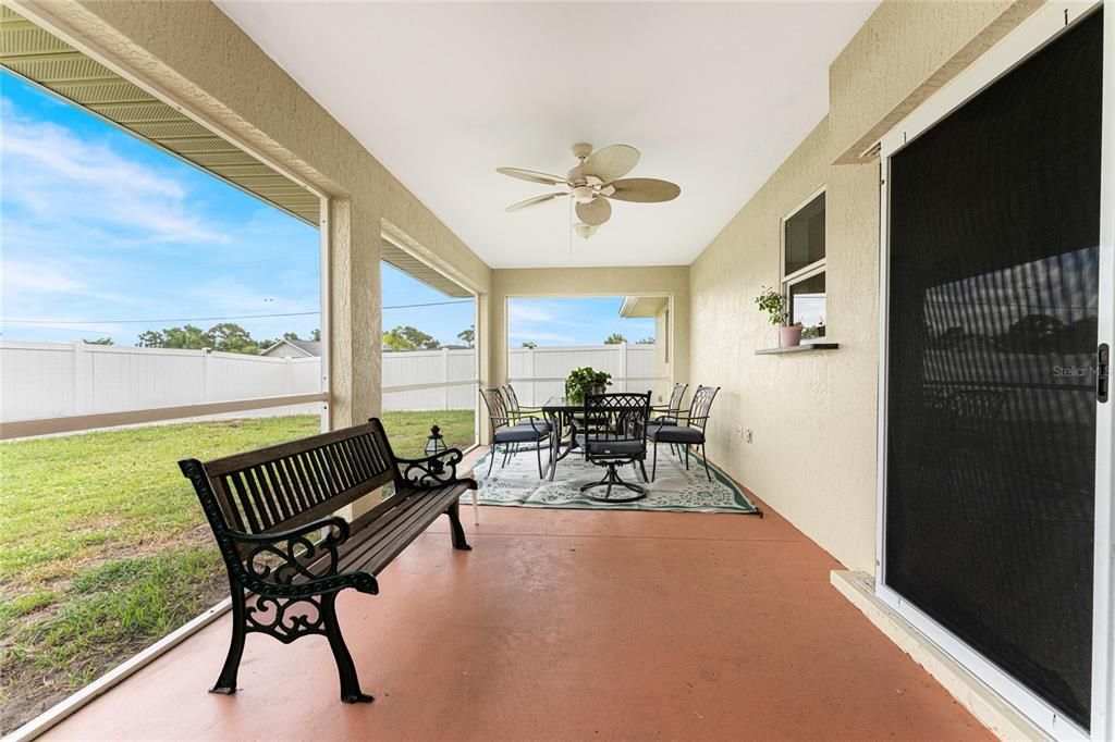 Sliding doors from the dining/kitchen area make entertaining easy!