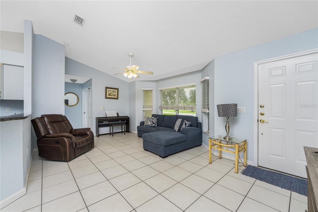 Tiled flooring in the living room makes for easy maintenance!