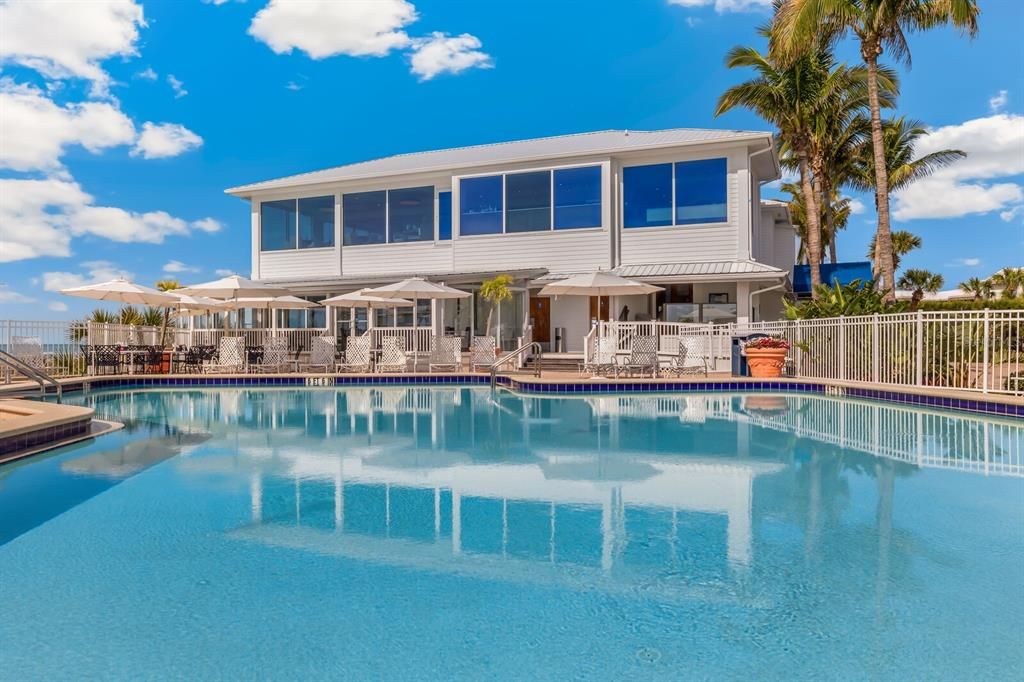 Main Swimming Pool by Club House on Gulf. Features "kiddie" swimming pool, spa, towel service, and chair/umbrella service for those heading to the beach!