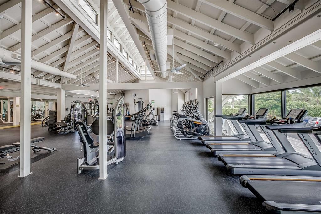Spacious fitness center with SEVERAL treadmills and elypticals, exercise machines, water stations, stretching area, towel service and TV available!