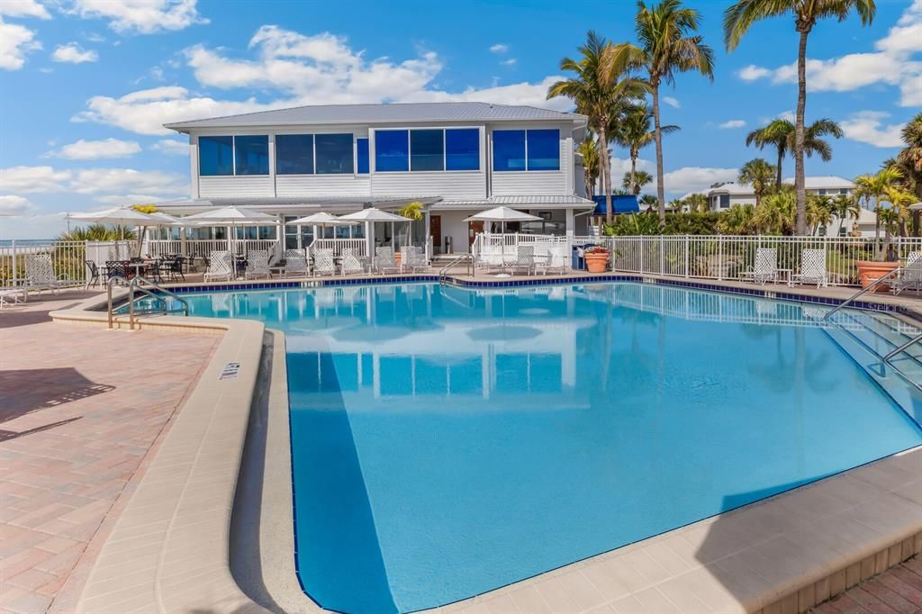 Main Swimming Pool by Club House on Gulf. Features "kiddie" swimming pool, spa, towel service, and chair/umbrella service for those heading to the beach!