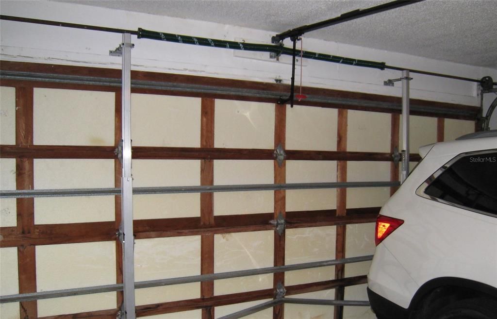 Steel hurricane supports for garage