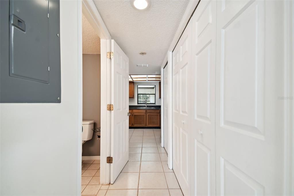 1st floor foyer leadibg from kitchen to guest bathroom