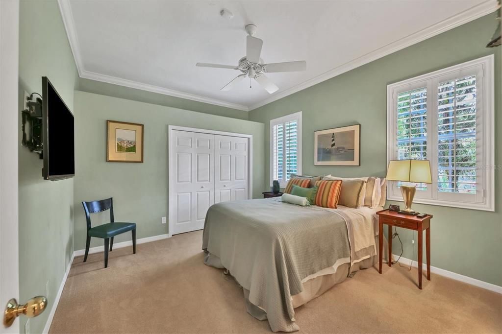 Spacious bedroom 2 with plantation shutters, new custom carpet, tranquil design and paint guest are sure to never want to leave!