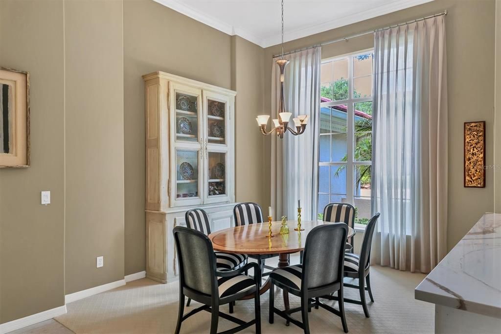 Formal dining room cascading with natural light