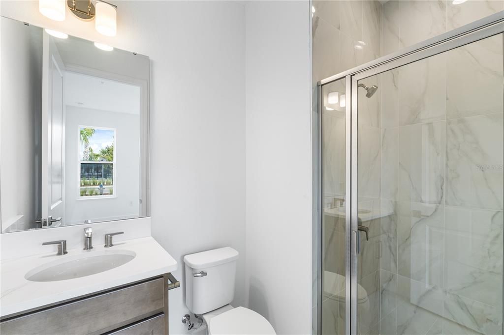NOT THIS HOME - SIMILAR FIRST LEVEL BATHROOM