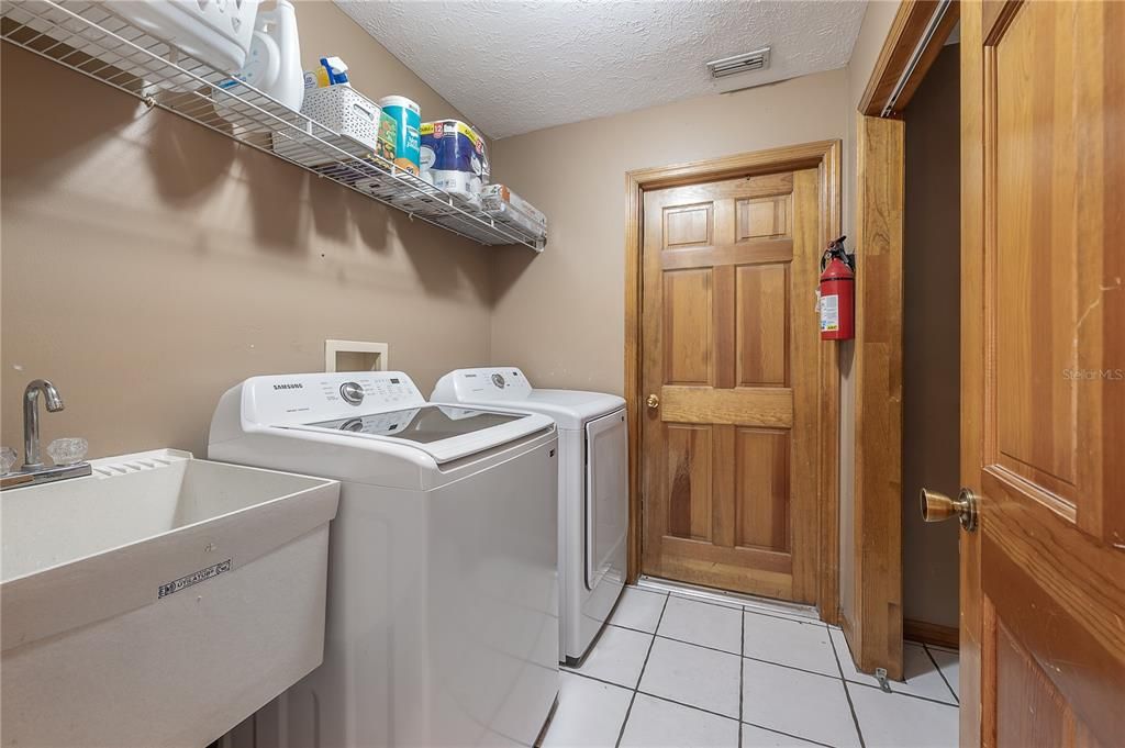 Spacious laundry room that connects to garage