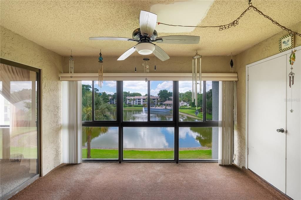 Look at that view! Great size, glass Florida room.