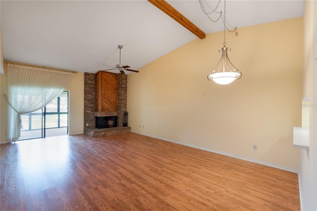 Bright living room with sliders to the patio