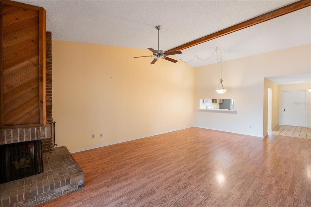 What a lovely fireplace! Don't miss that vaulted ceiling! Rare find in a condo!