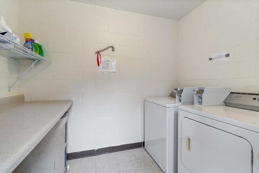 Shared Laundry Room is just steps away from the back porch.