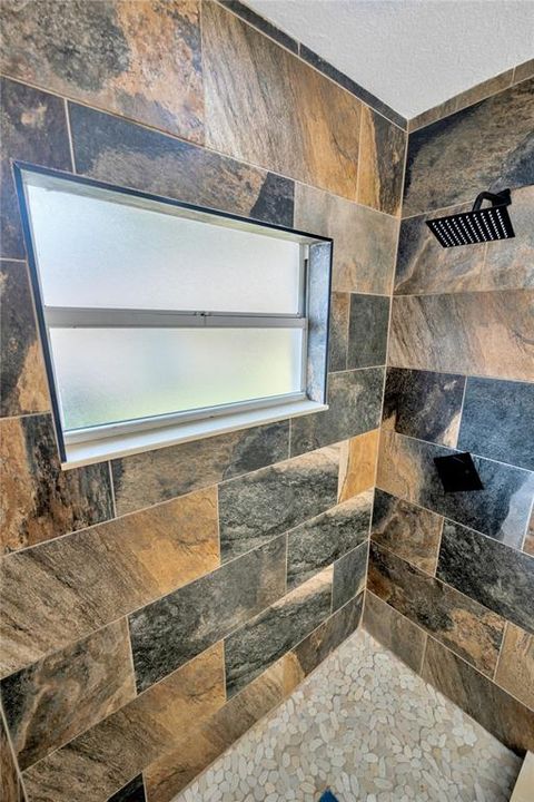 Custom shower with rainhead