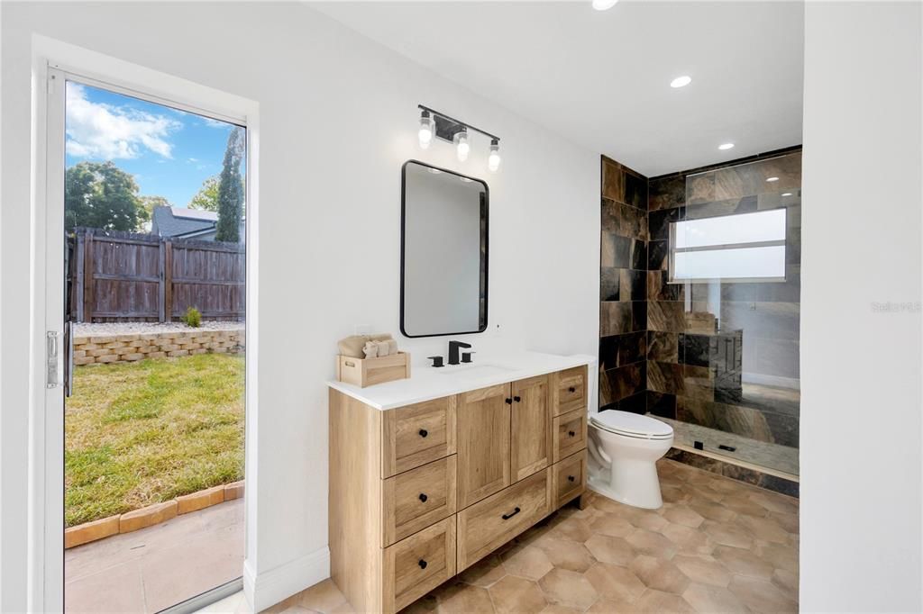 Secondary bathroom with exterior access
