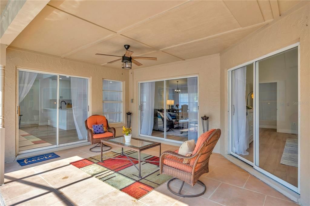 Beat the heat in this shaded patio by the pool