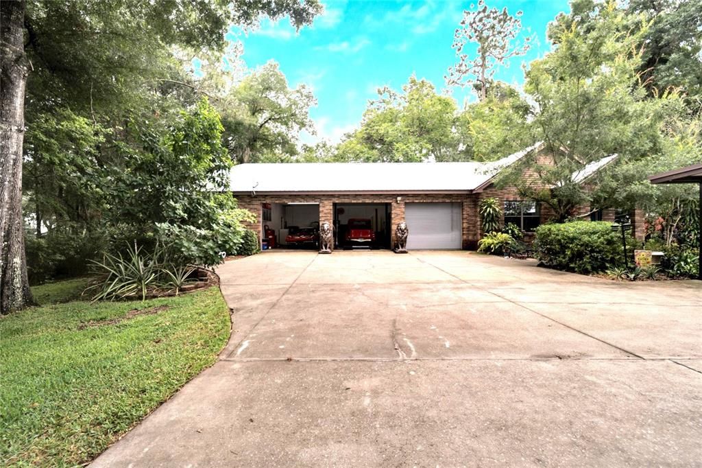 This is a Fully Air Condioned Garage/ Workshop with High gates and two Lifts, Wow!